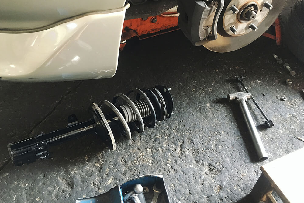 How Shocks and Struts Keep Your Car Stable in Summer Conditions